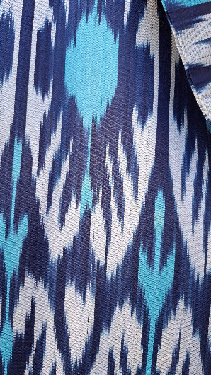 Handwoven Uzbek Ikat Chapan ,coat ,robe,kaftan ,jacket. Hand-dyed, hand loomed natural cotton/silk organic ikat from Uzbekistan